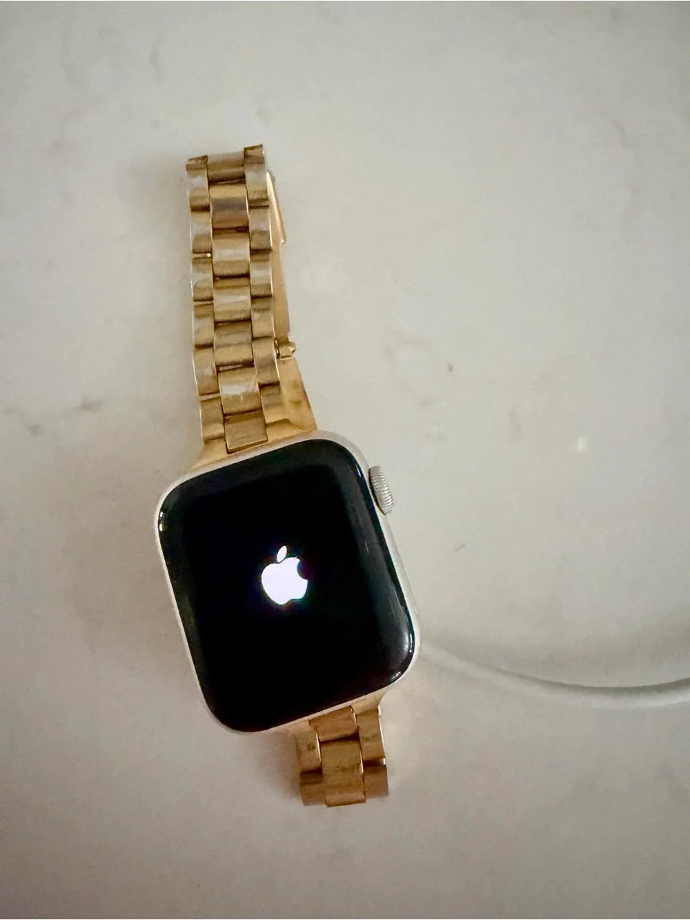 Apple Watch in Gold with Gold Metal Link Band